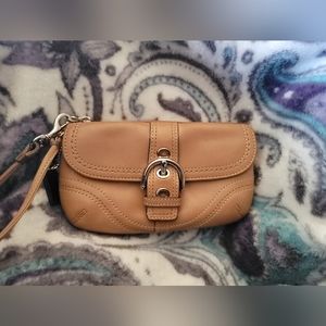 Tan faux-leather wristlet